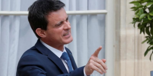 French prime minister manuel valls leaves the elysee palace in paris
