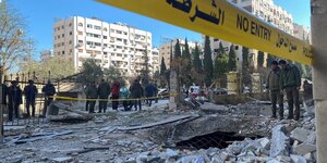 Le site d'une attaque a la roquette, au centre de damas, en syrie