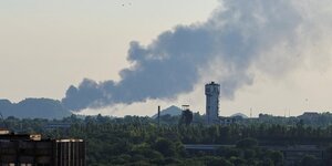 Smoke rises after shelling during ukraine-russia conflict in donetsk